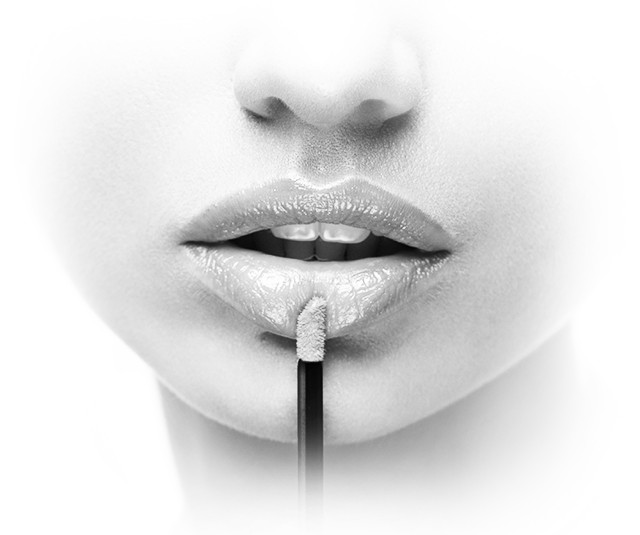 A black and white picture of a woman pressing a Lint Free Applicator against her lips